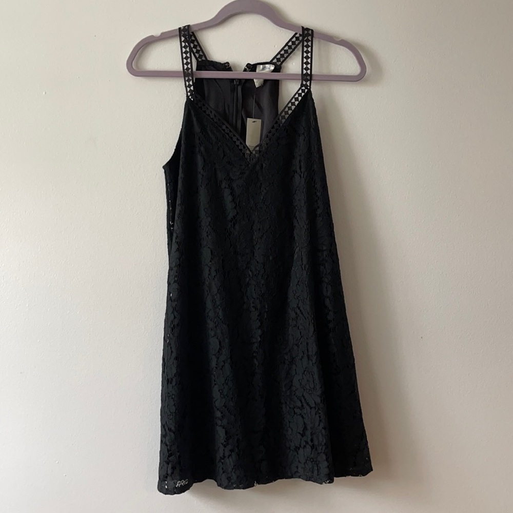 Black lace dress with strap and v neck detailing